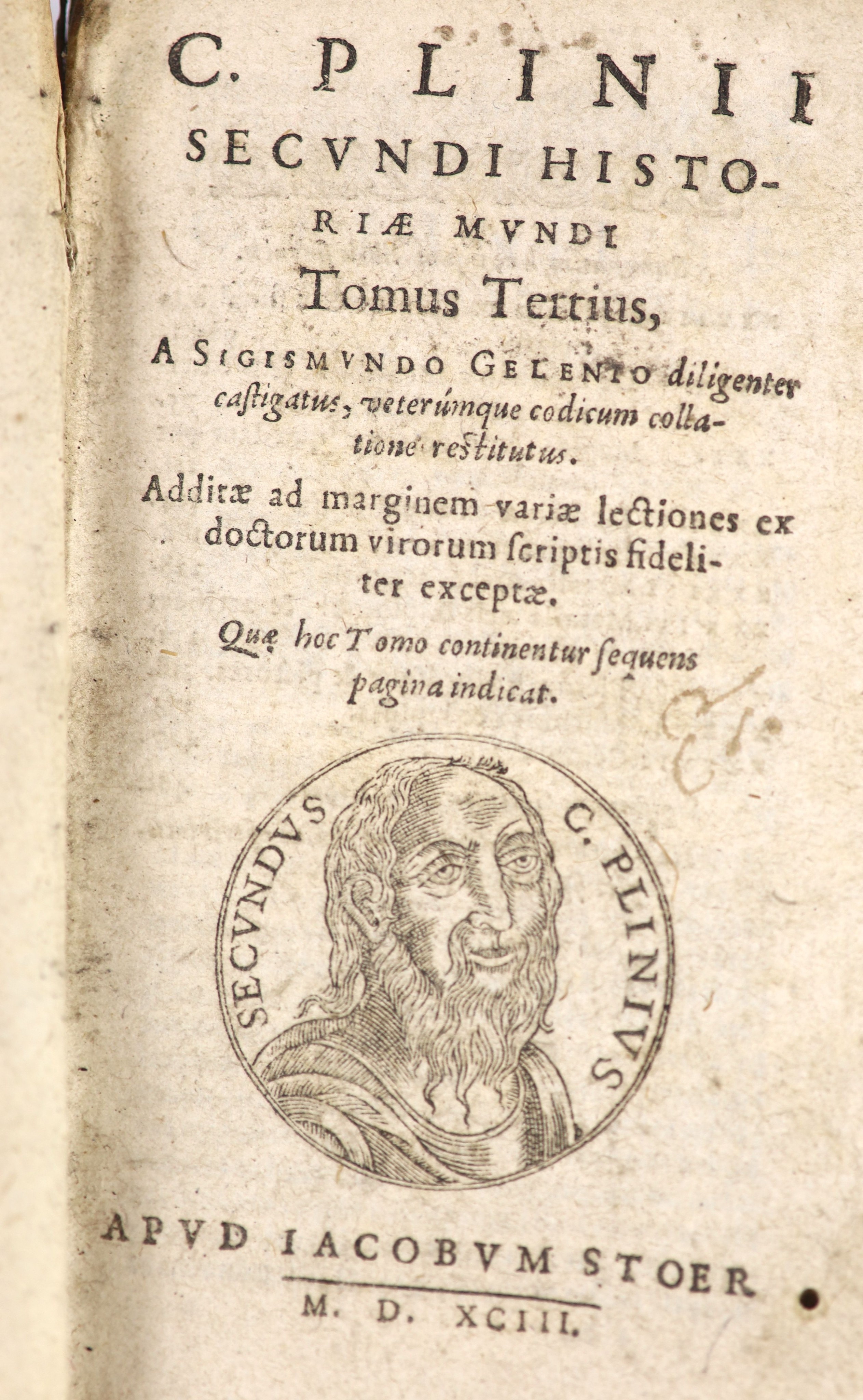Pliny - Historiae Mundi. Tomus tertius, a Sigismundo Gelento diligenter castigatus ... engraved title device, head and tailpiece decorations; 544, (428)pp.; old calf with panelled